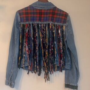 Upcycled flannel plaid patched fringe back boho jean jacket